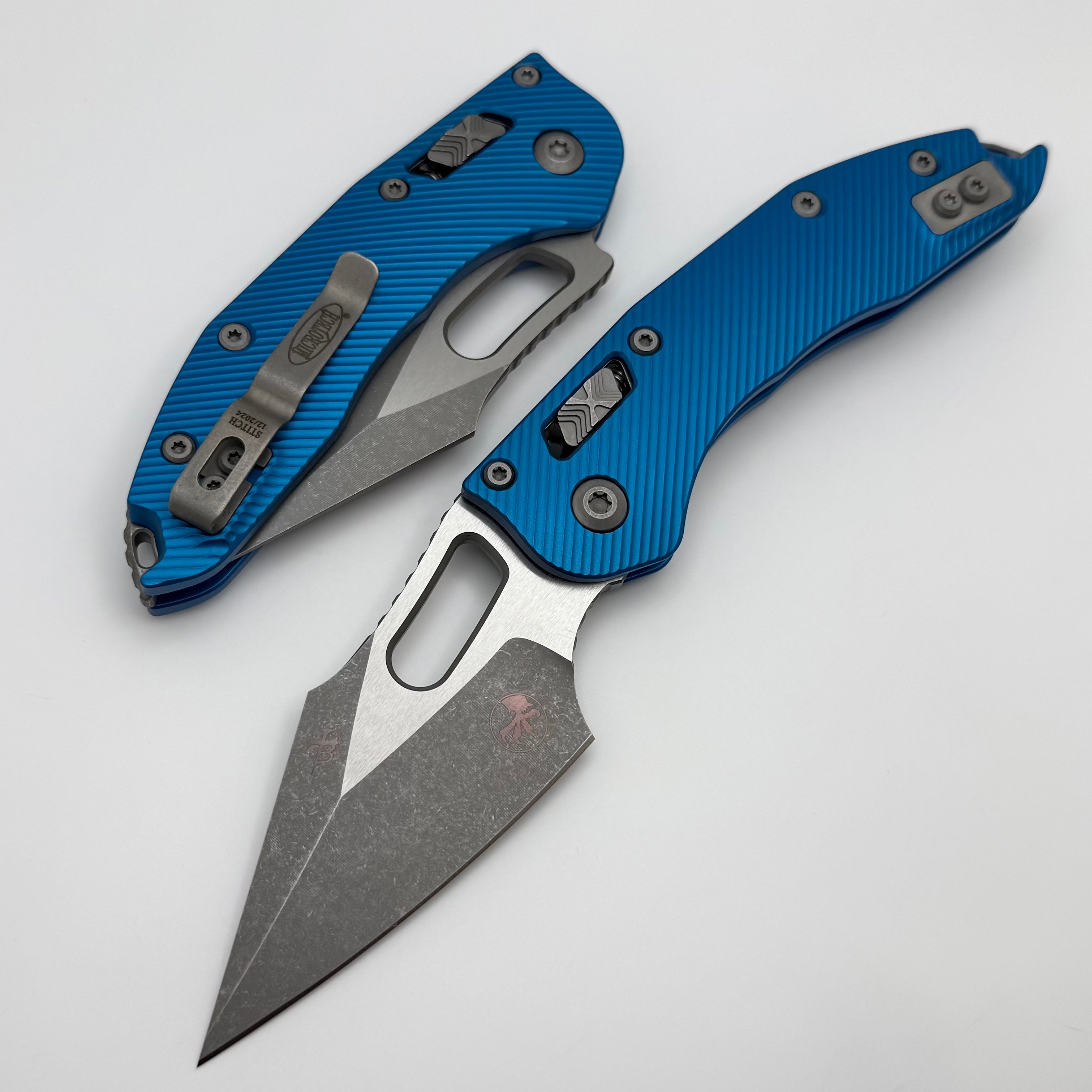 Tyler magneato 7’0” Microtech Knives Manual Stitch RAM LOK Fluted Blue Aluminum Apocalypti