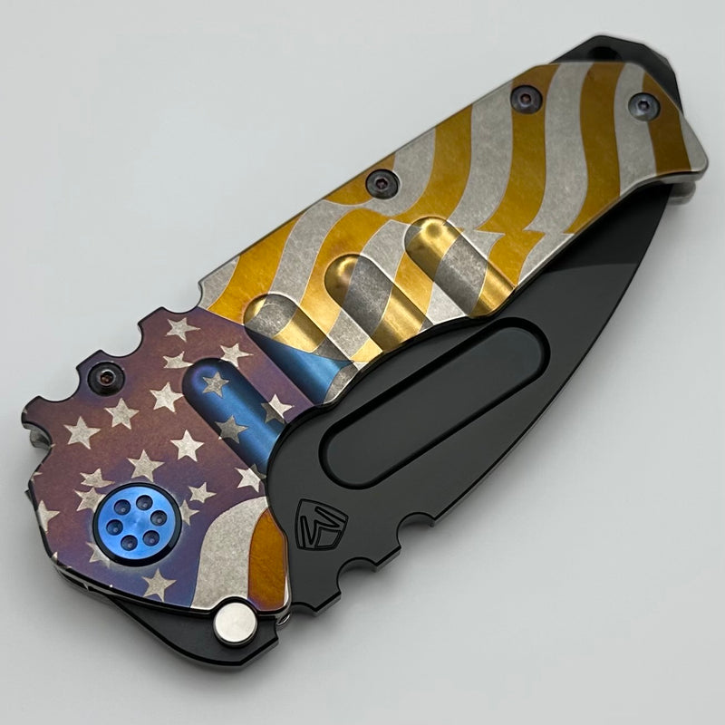 Medford Knife Praetorian T DLC S90 Drop Point & Billowing Flag Engraved Handle w/ Blue Hardware