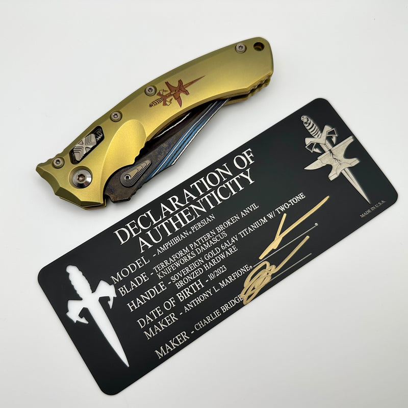 Marfione Custom Knives Amphibian RAM-LOK Terraform Pattern Broken Anvil Damascus & Sovereign Gold Stippled Titanium w/ Joint Logo Dagger Engraved & Two Tone Bronzed Hardware