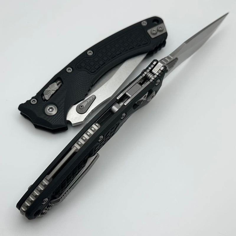 Microtech Amphibian RAM LOK Black Frag G-10 & Partial Serrated Stonewash M390MK 137RL-11FRGTBK