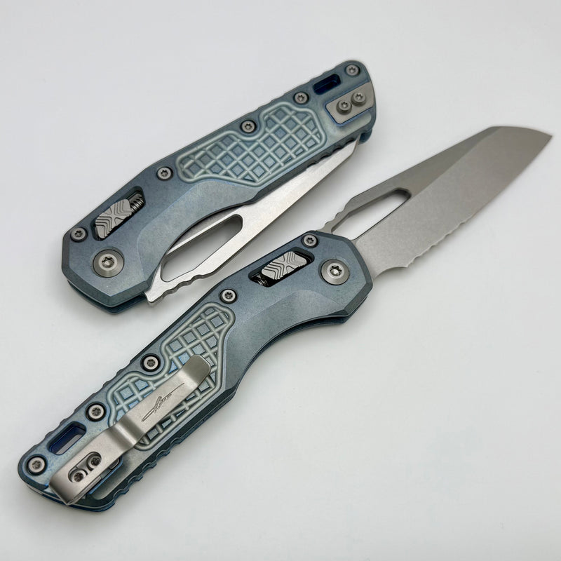 Microtech Marfione Select MSI RAM LOK Ice Blue Titanium Frag Handles w/ Double Vapor Blast & Blue Accents & Part Serrated Stonewash M390MK 210-11FRMS6