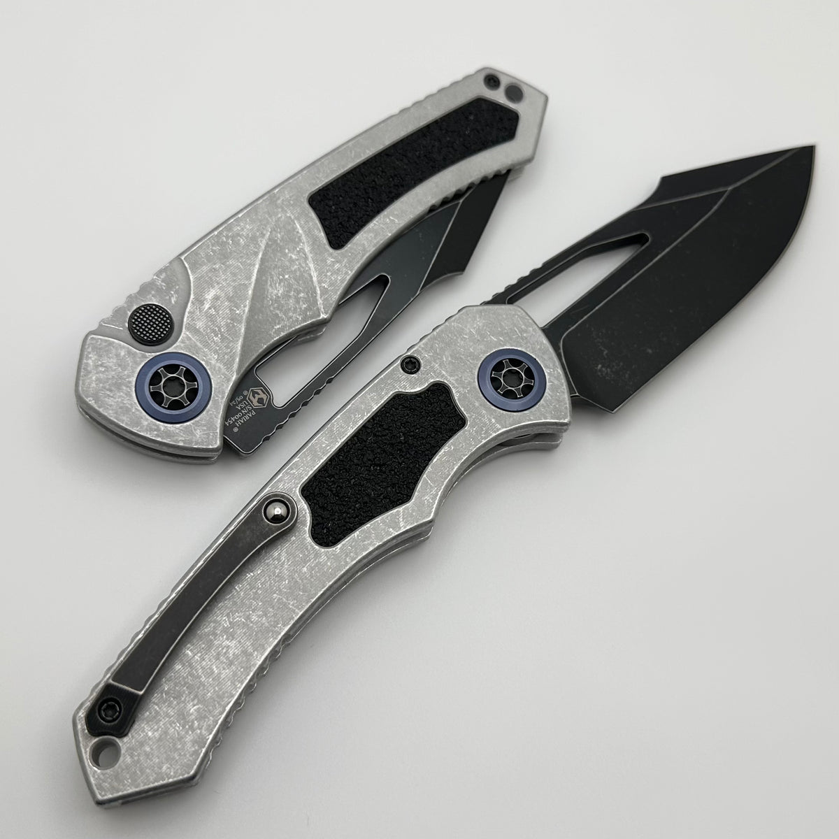 Heretic Knives Pariah M/A Button Lock Blizzard Worn Aluminum Handles w
