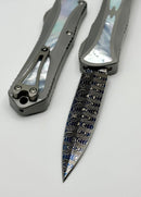 Heretic Knives Manticore X Hand Ground Vegas Forge Blued Damascus D/E & Hefted Stainless Steel Handle w/ Mother of Pearl Inlays