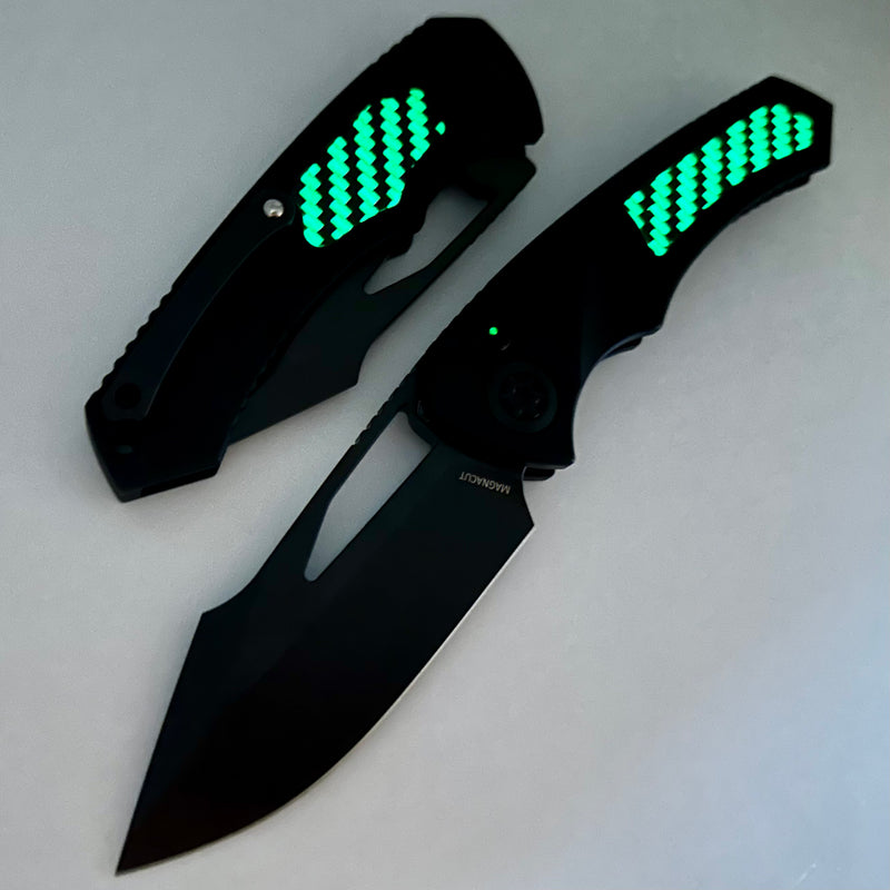 Heretic Knives Pariah M/A Button Lock Black Aluminum Handles w/ Glow In The Dark Carbon Fiber & DLC MagnaCut H046-6A-GLO/CF