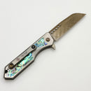 Heretic Knives Custom Jinn Flipper w/ Titanium Abalone Inlaid Handles & Hand Ground Bronze Damascus