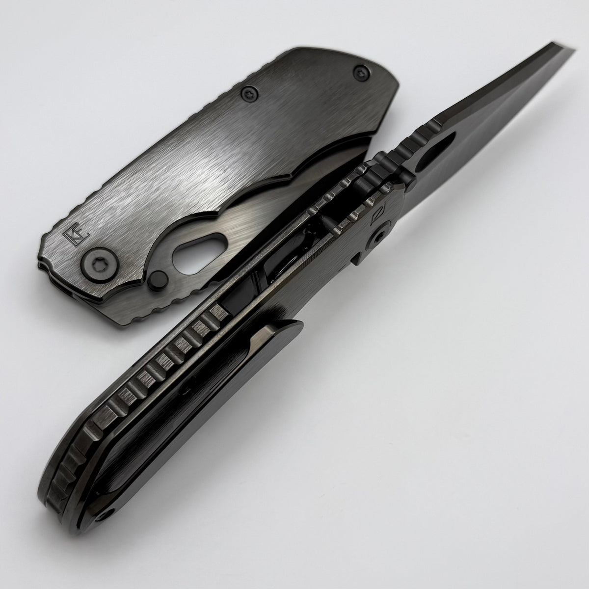 Custom Knife Factory & Rotten Design EVO 1.1 Polished DLC Ti Handles w