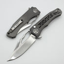 Heretic Knives Custom Wraith V4 Manual Vented Distressed Titanium Handles & Hand Ground Cracked Ice Bowie