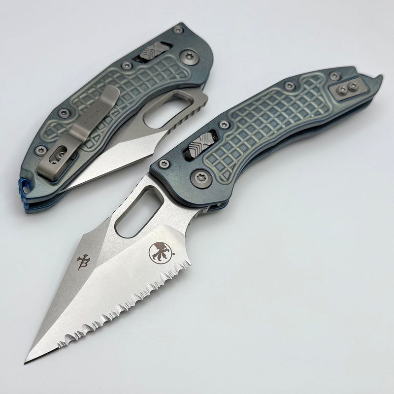 Microtech Marfione Select Manual Stitch RAM LOK Ice Blue Titanium Frag Handles & Full Serrated Stonewash M390MK w/ Double Vapor Blast/Blue Accents 169RL-12FRMS6