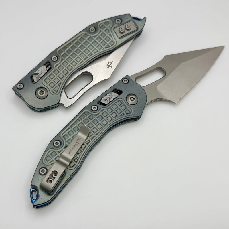 Microtech Marfione Select Manual Stitch RAM LOK Ice Blue Titanium Frag Handles & Full Serrated Stonewash M390MK w/ Double Vapor Blast/Blue Accents 169RL-12FRMS6