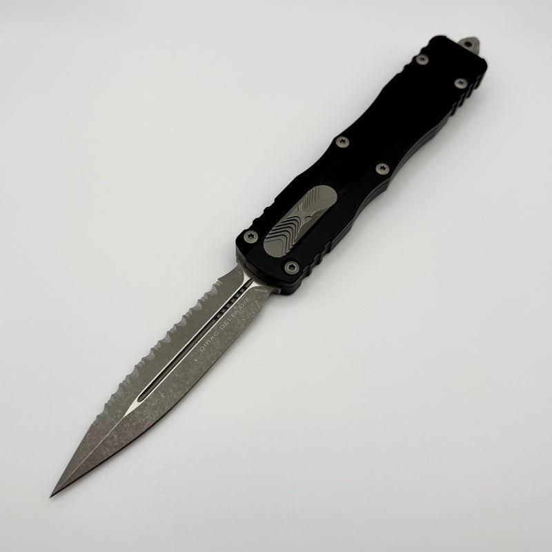Microtech Dirac Delta D/E Full Serrated Apocalyptic w/ Black Handles 2 Microtech Dirac Delta D/E Full Serrated Apocalyptic w/ Black Handles 2