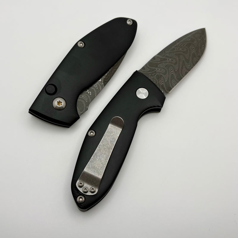 Defiant 7 Alpha w/ Black Aluminum Handles & Stainless Damascus