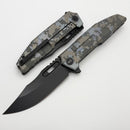 We Knife Barracks Pixel Pattern Titanium and Black Stonewashed M390 WE25078-3