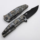 We Knife Barracks Pixel Pattern Titanium and Black Stonewashed M390 WE25078-3