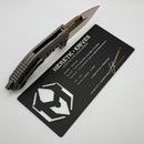 Heretic Custom Medusa M/A Titanium w/ Aletai Meteorite Inlays & Bronze Cracked Ice Tanto M390