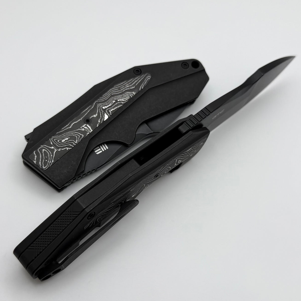 We Knife Coral SLT Flipper w/ Black Titanium Handle w/ Aluminum Foil C