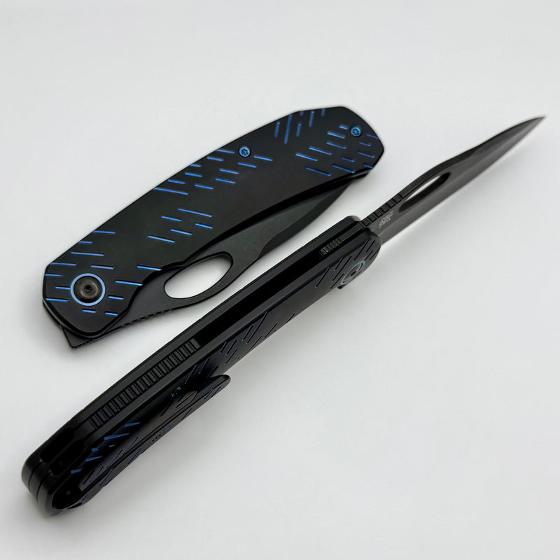 We Knife Inmate Black Titanium w/ Blue Raindrops Handles w/ Black Ston
