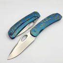 We Knife Inmate Blue Titanium w/ Golden Raindrops Handles w/ Satin CPM-20CV WE23096B-3