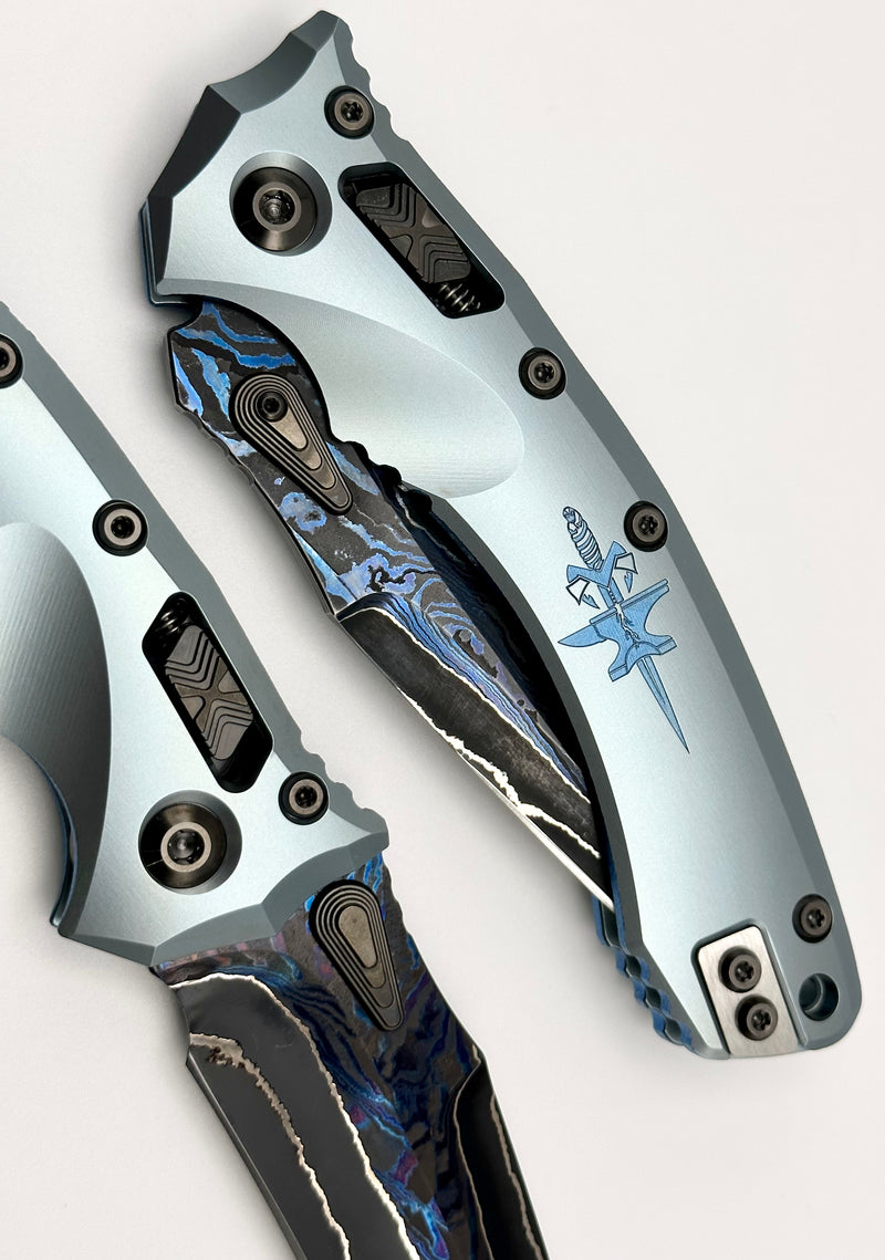 Marfione Custom Knives Amphibian RAM-LOK Metroid Broken Anvil Damascus & Ice Blue Stippled Titanium w/ Joint Logo Dagger Engraved