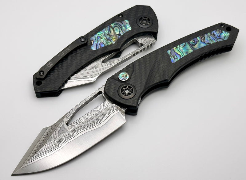 Heretic Knives Pariah Custom M/A Button Lock Carbon Fiber & Abalone Inlay w/ Vegas Forge Wood Grain San Mai Damascus