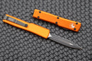 Microtech UTX-70 D/E Black Fully Serrated & Orange 147-3OR