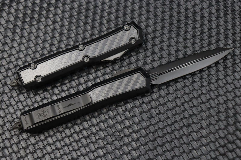 Microtech Makora Shadow DLC D/E Full Serrated w/ DLC Hardware Nickel Boron Internals & Carbon Fiber Inlays 206-3DLCTCFISH