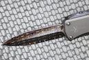 Marfione Hera D/E Spike Grind Hot Blued Vegas Forge Reptilian Pattern Damascus & Black Anodized Handle w/ Zircuti Button & Pocket Clip & DLC Two Tone Hardware