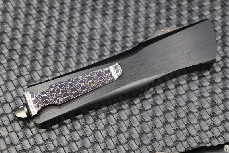 Marfione Custom Knives Combat Troodon D/E Vegas Forge Hot Blued Sharktooth Pattern Blade/Clip w/ Hefted Black Handle & DLC Ringed Hardware