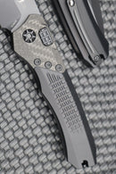 Heretic Knives Wraith Auto Black Drop Point w/ Carbon Fiber Bolster & Black Handle w/ Blue Pivot Collar H000-4A-T