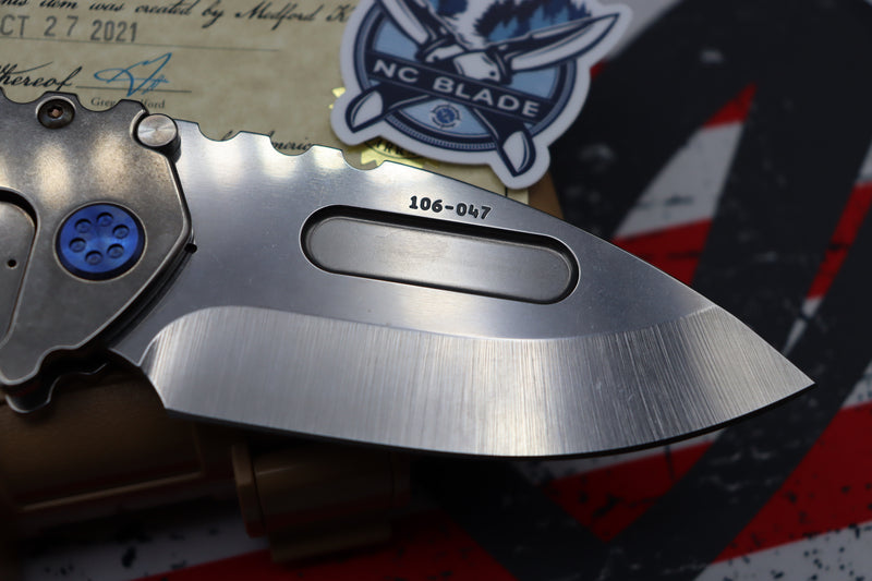 Medford Knife Praetorian T “We The People” Engraved & Blue Hardware with S35 Drop Point 106-047
